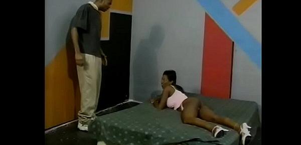  Bald black guy licks the shaved pussy of a young ebony whore and fucks her in different positions